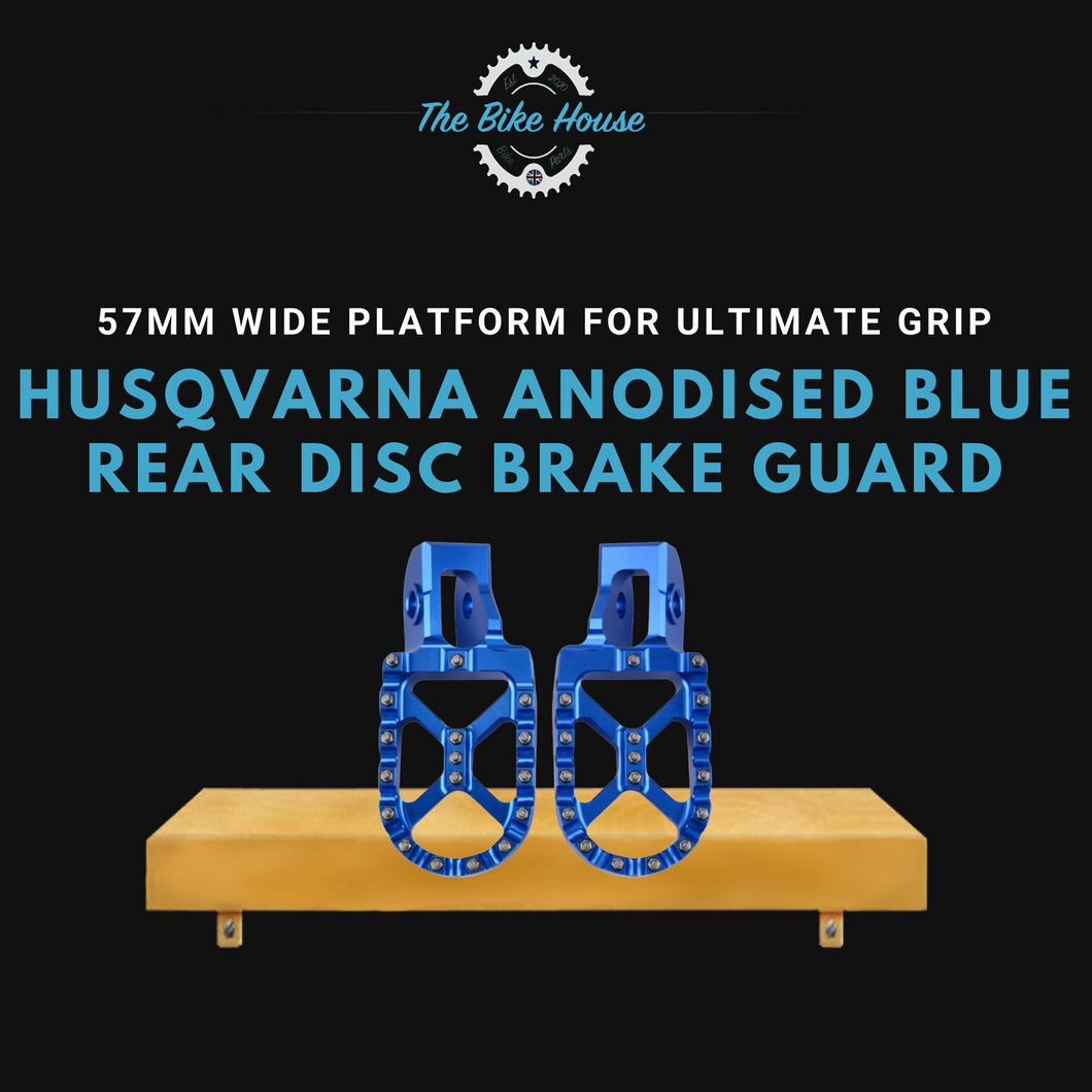 HUSQVARNA ANODISED BLUE CNC 57mm WIDE FOOT PEGS FOR ULTIMATE GRIP STAINLESS TEETH